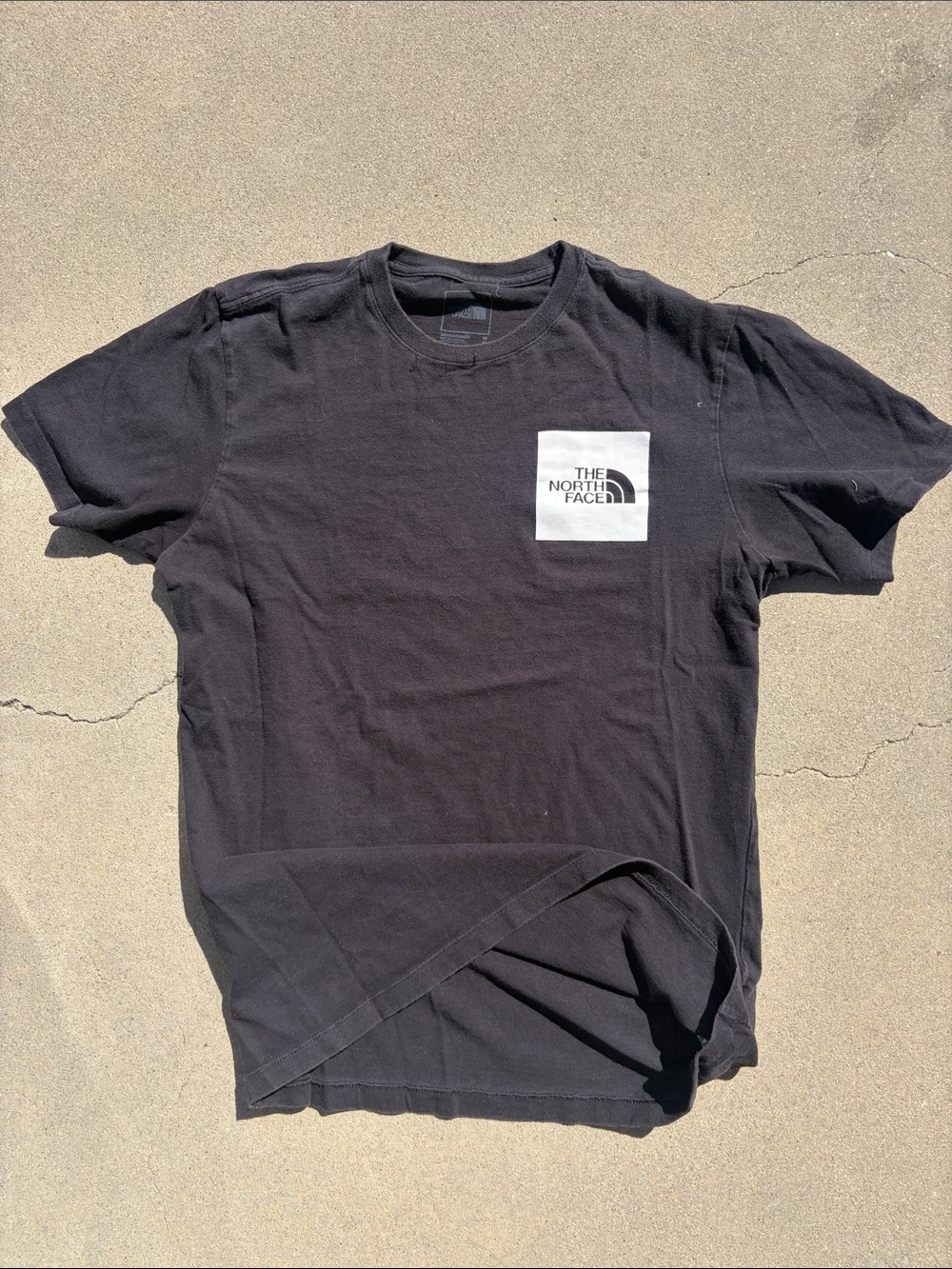 The North Face Men's Black Tee with White Logo Patch